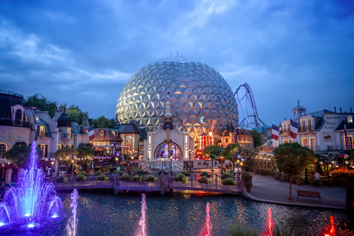 Eurosat – CanCan Coaster and the French themed area at Europa-Park at dusk.