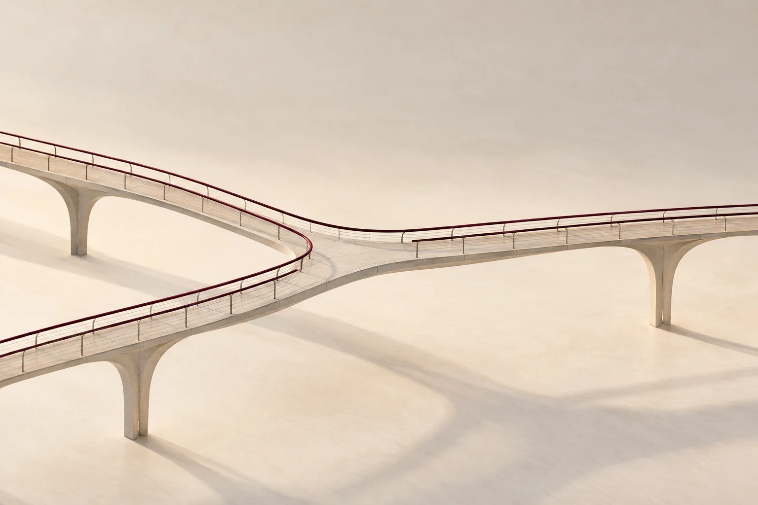 Two pale-stone bridges join into one deck with a continuous burgundy handrail.