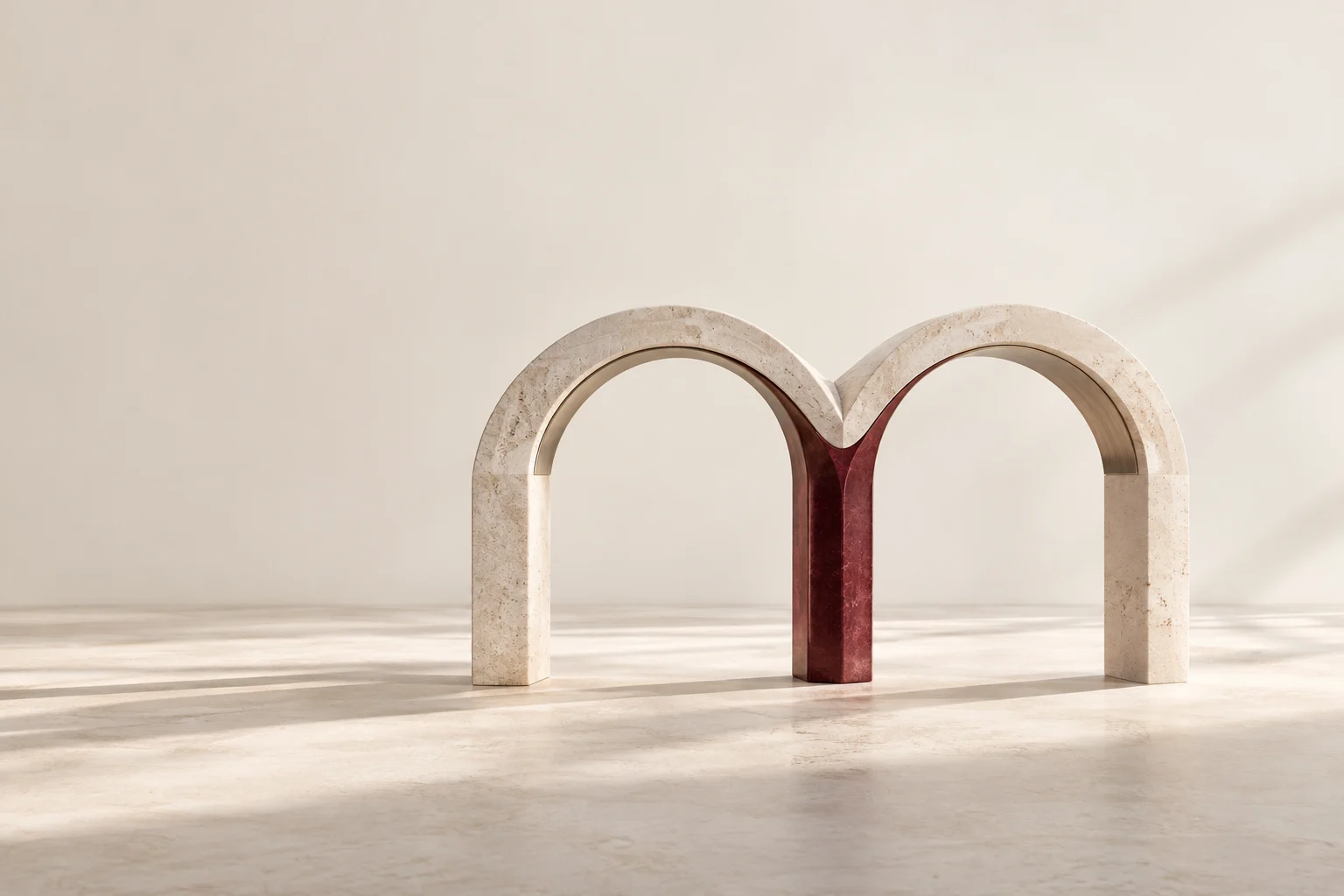 Two stone arches share one burgundy central support.