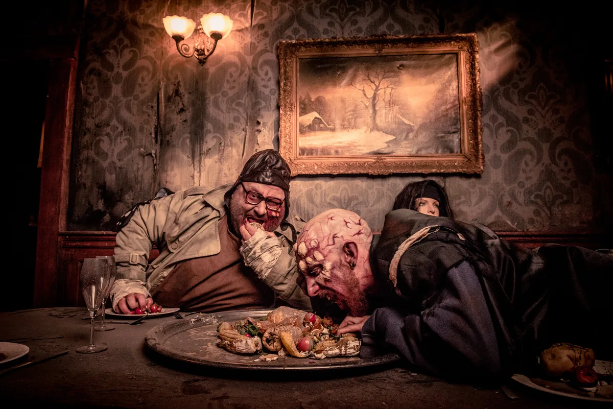 Costumed performers in a theatrical horror scene at Traumatica.
