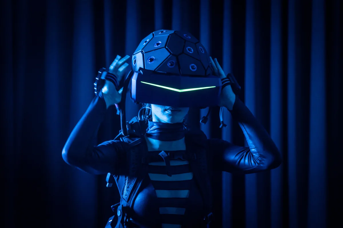 A participant wearing a YULLBE virtual-reality headset.