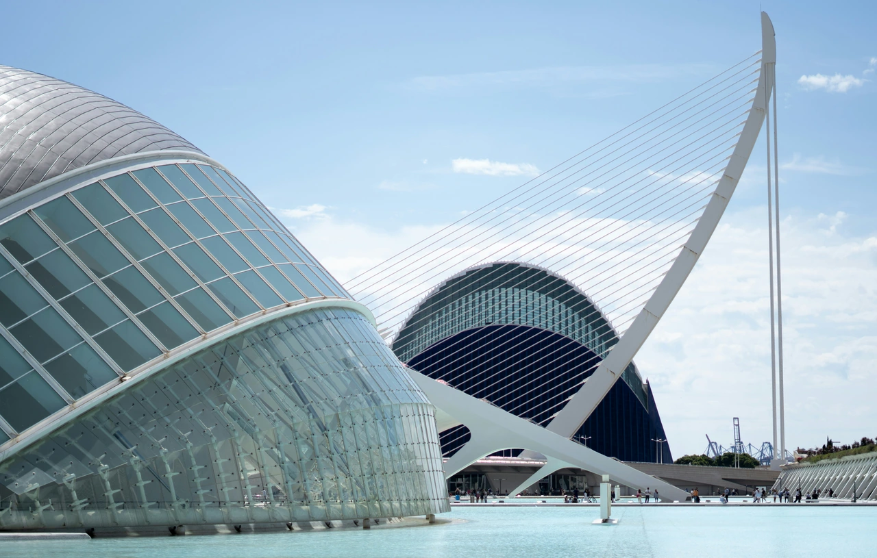 Glass, white ribs, and reflecting pools at Valencia’s City of Arts and Sciences, photographed in clear daylight