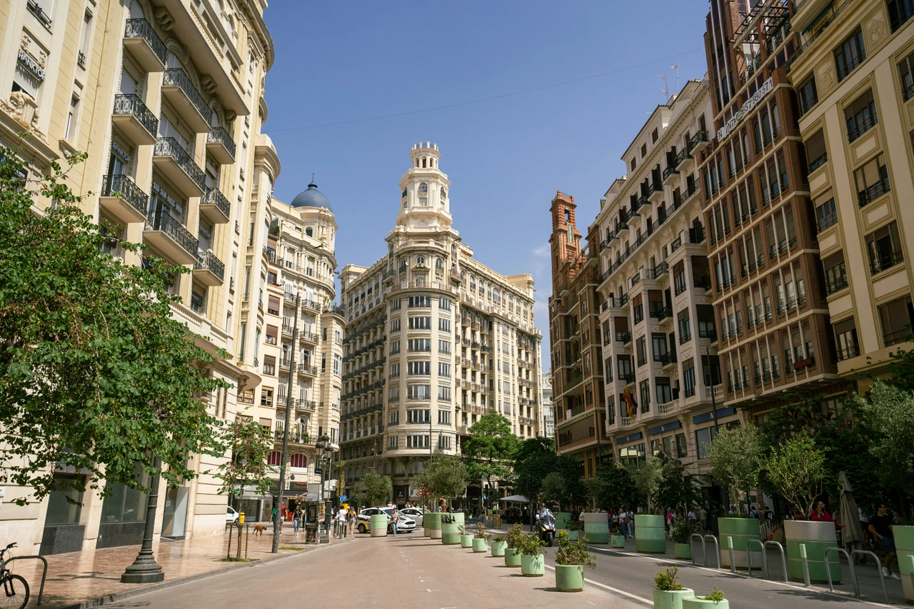 Ornate historic facades and the open pedestrian space of Plaza del Ayuntamiento in Valencia