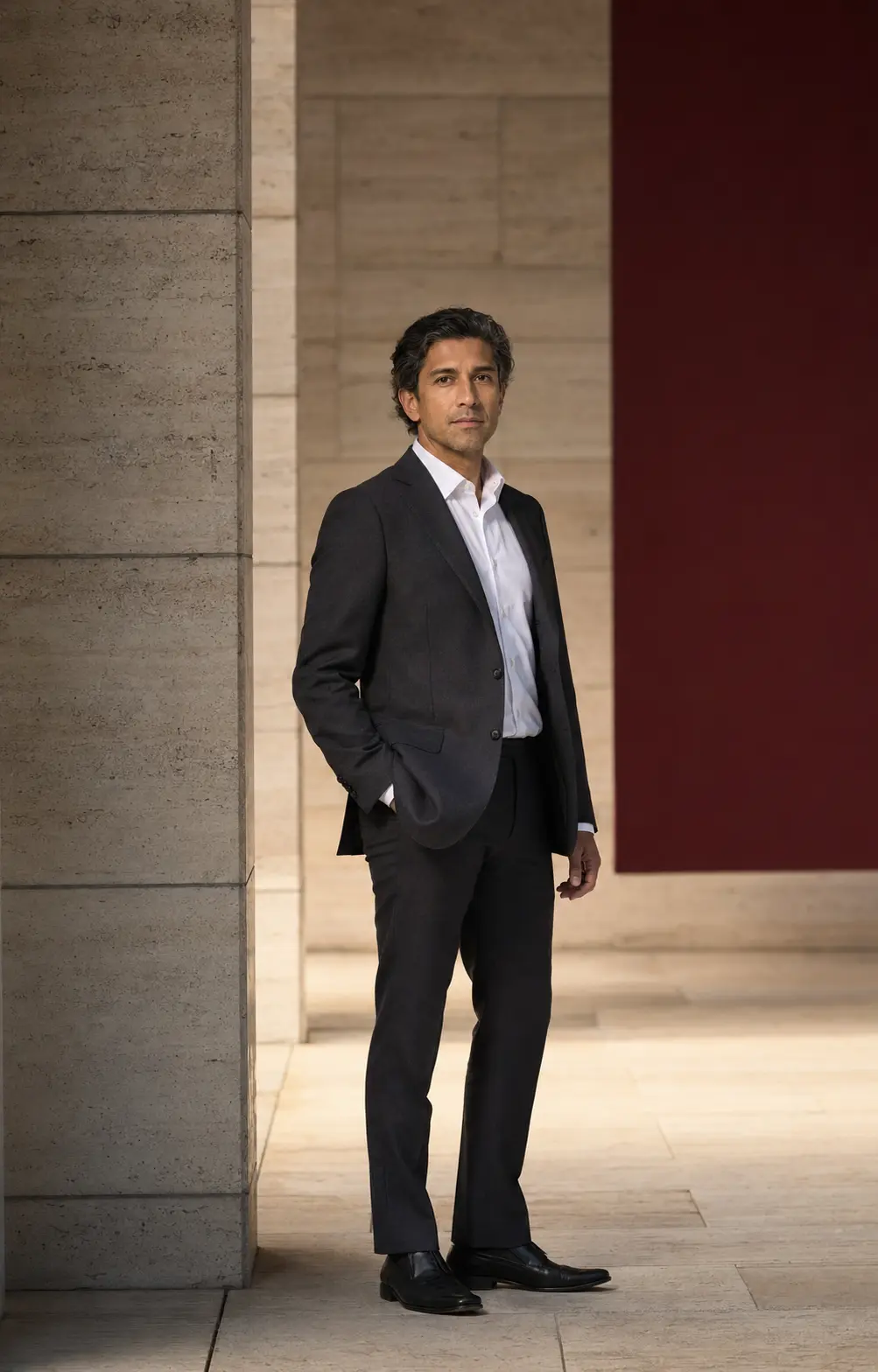 Senior Scipio adviser in a contemporary executive setting